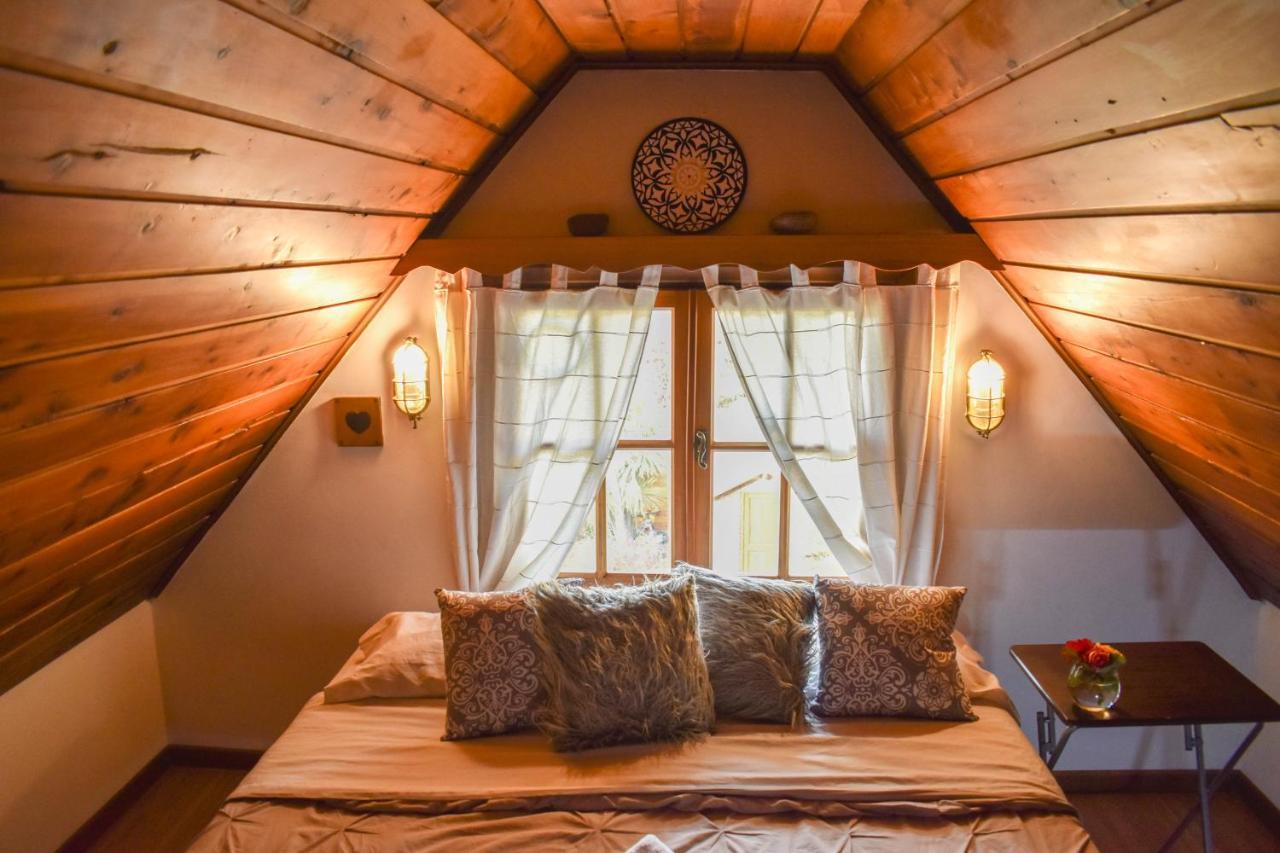 Quarto Triplo com Banheiro Compartilhado